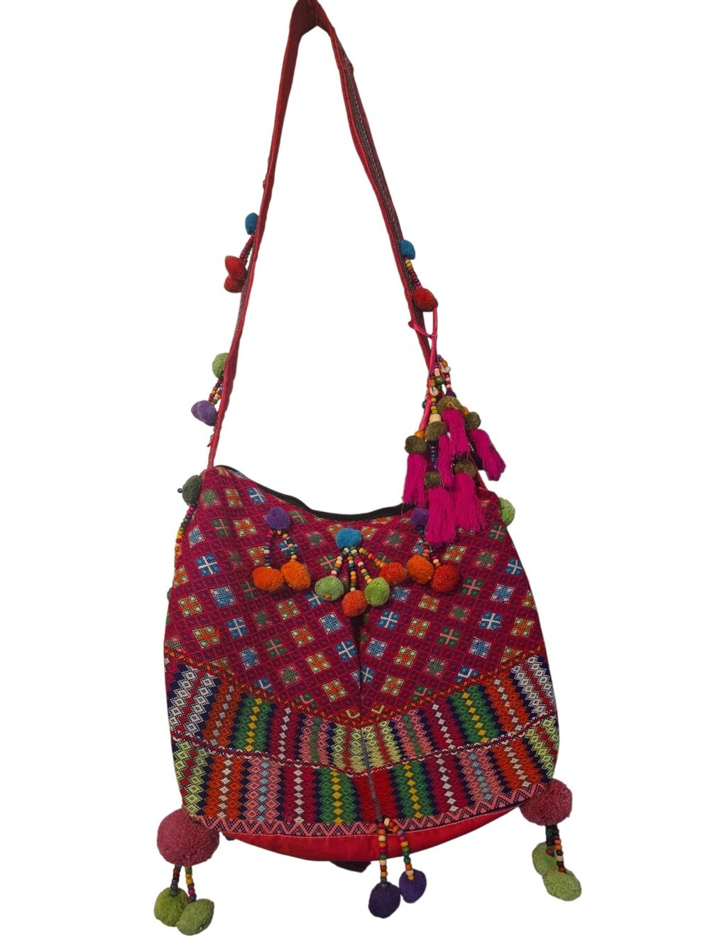 Colorful, handcrafted bohemian shoulder bag with traditional woven details